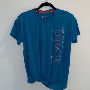 Orange Theory short sleeve knotted women’s shirt teal blue